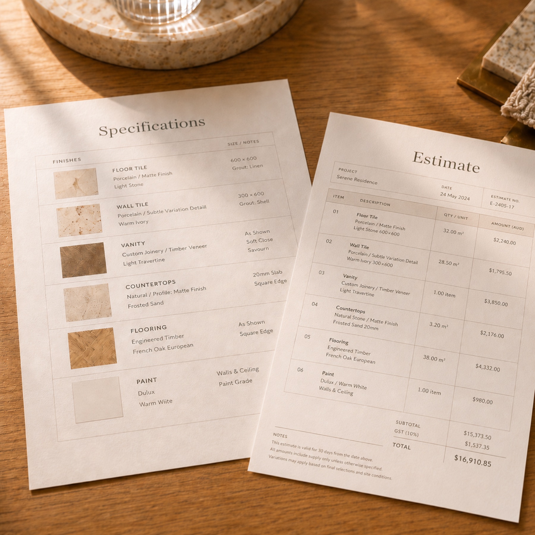 Specifications and estimate documents on a wood table