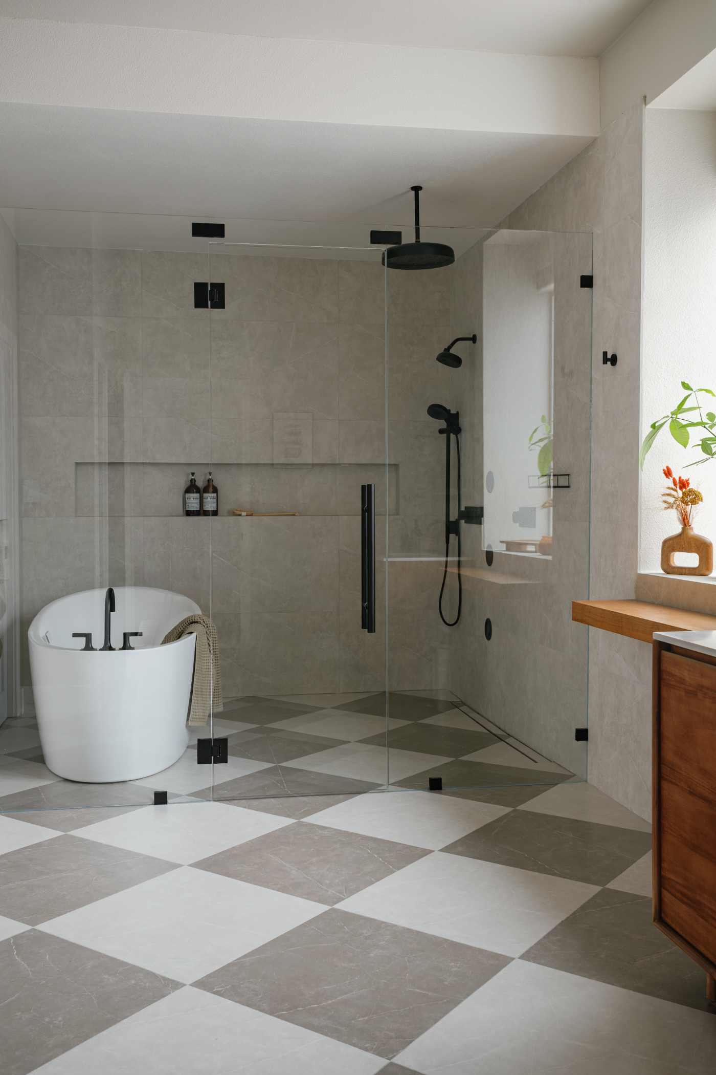 Bathroom with checkered floor after the remodel