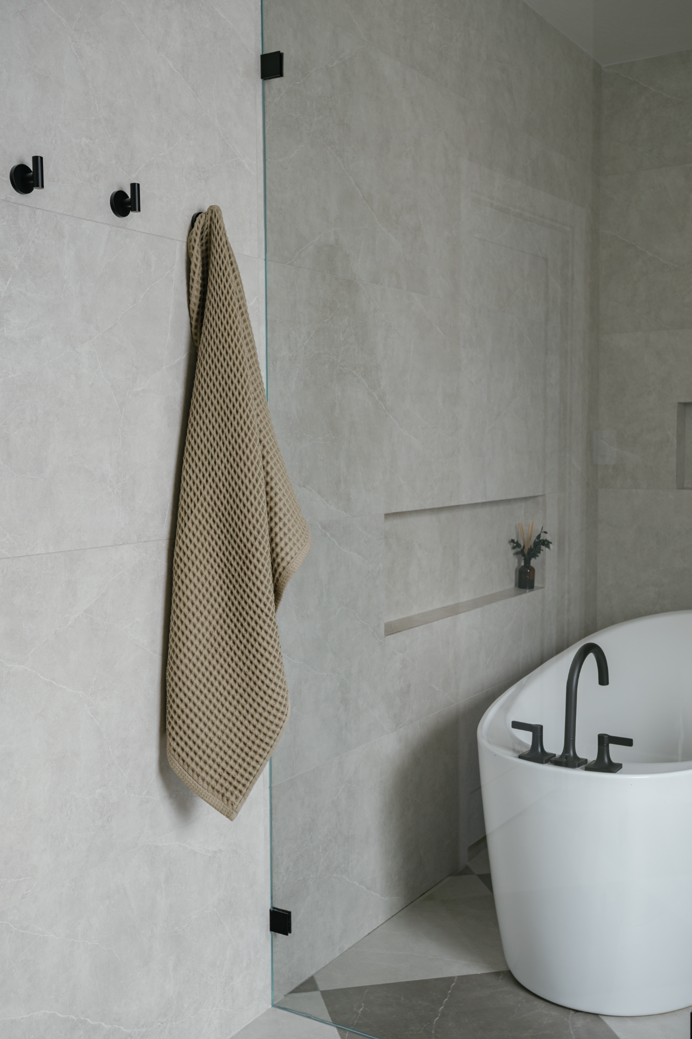 Shower detail with niche and towel