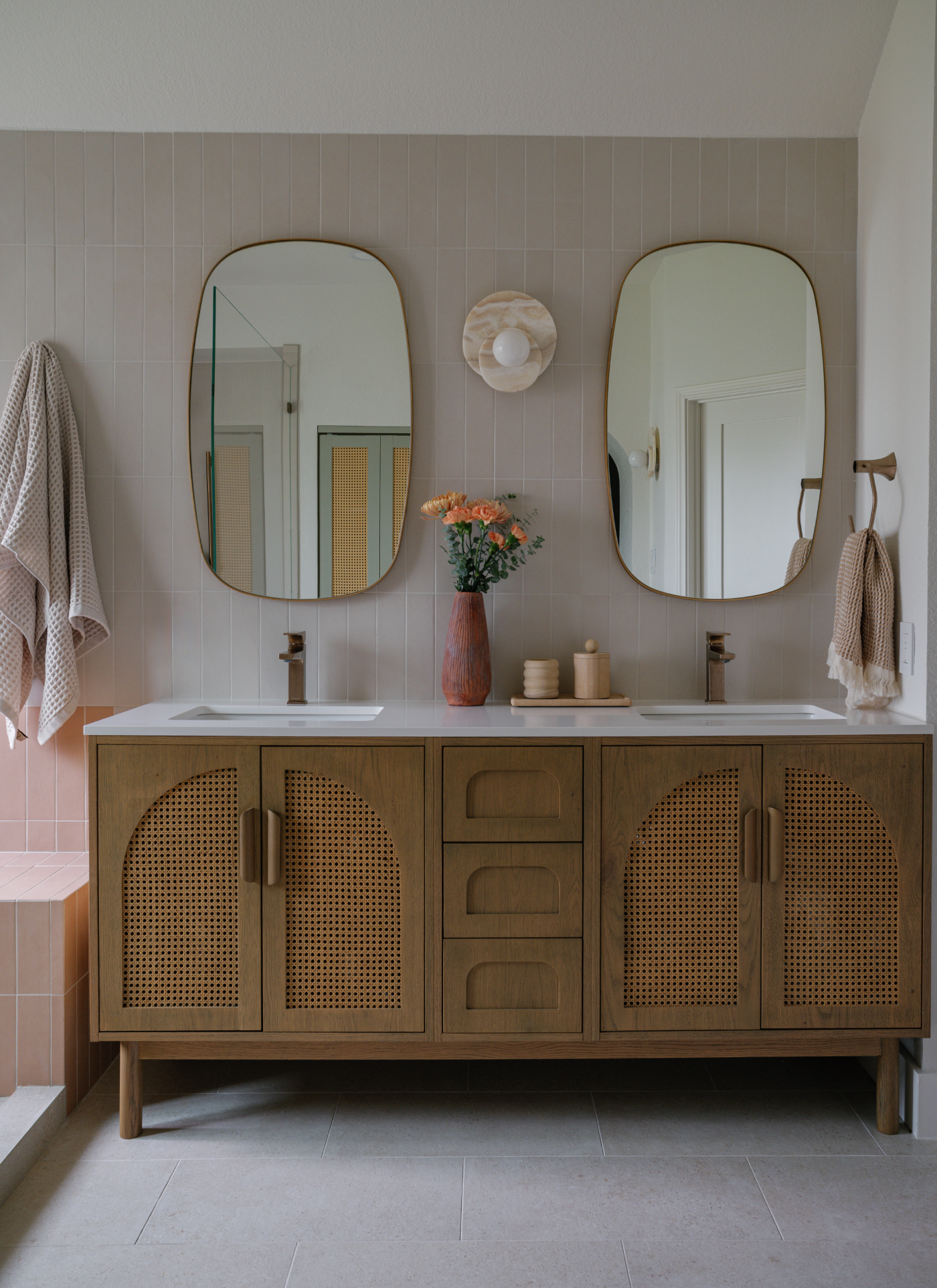 Double vanity with cane cabinet doors