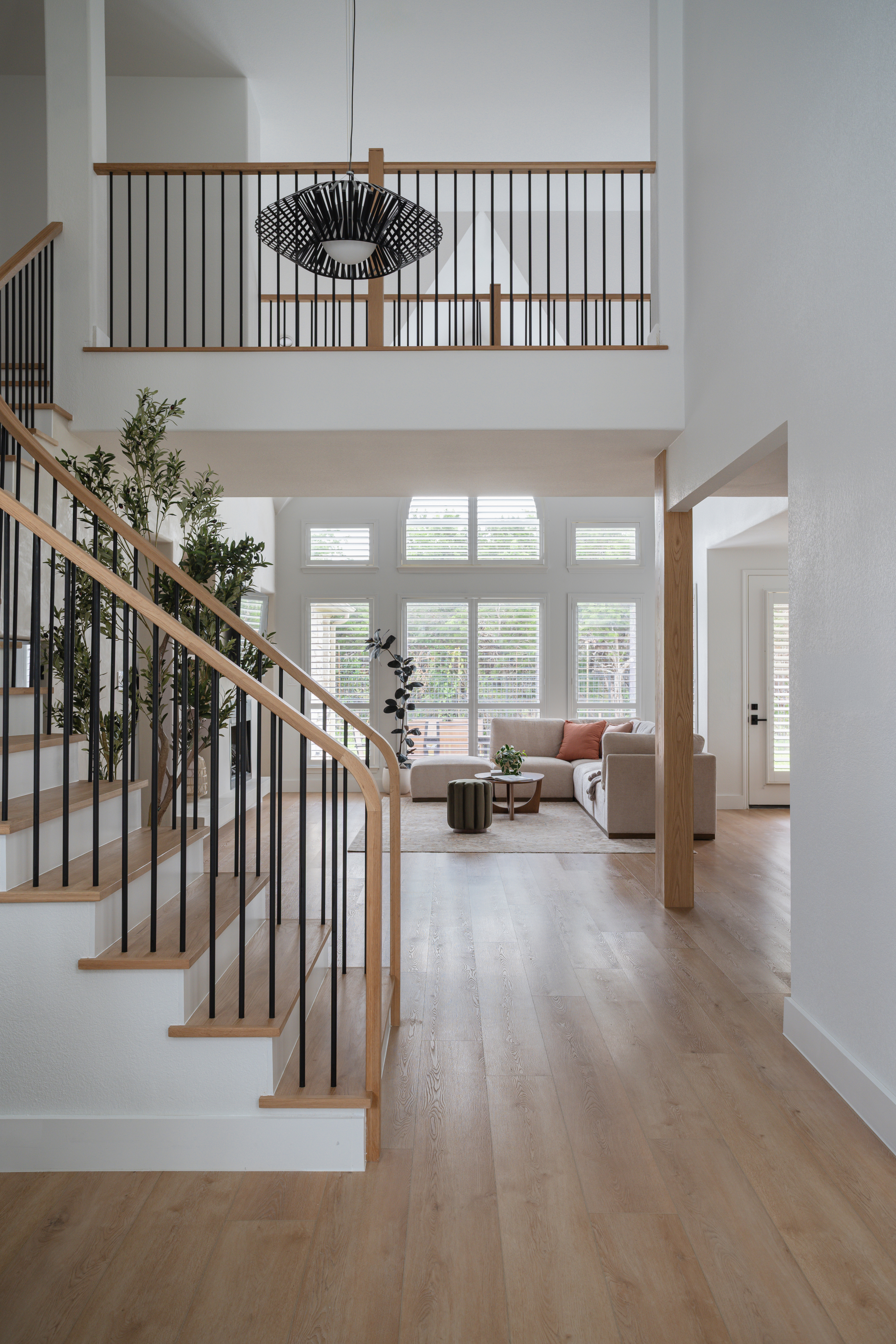 Two-story entry with staircase after the remodel
